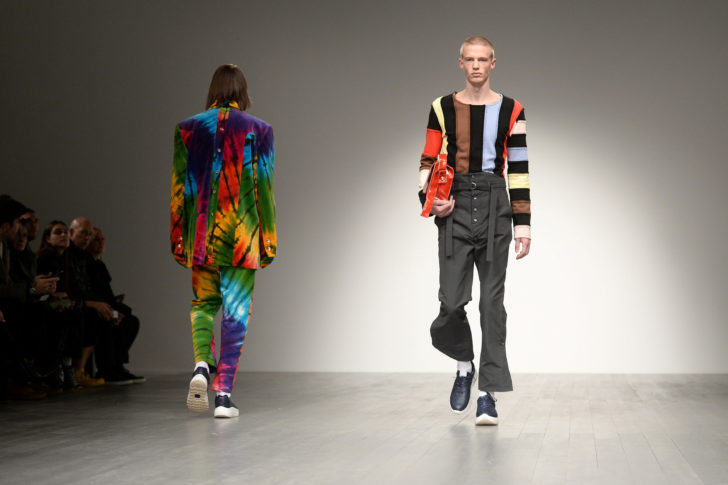 Models display creations during Alex Mullins' show at London Fashion Week Men's in London