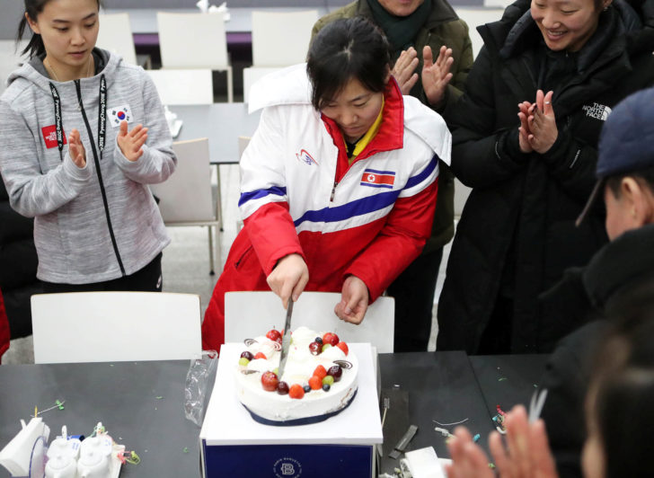 A North Korean women's ice hockey athlete is congratulated on her birthday in Jincheon National Training Centre in Jincheon