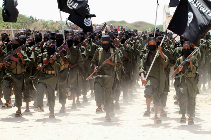 FILE PHOTO: New recruits of Somalia's al-Qaeda linked al Shabaab militia march during a passing out parade at a military training base in Afgoye, west of Mogadishu