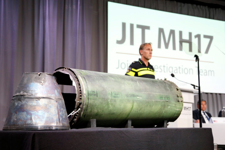 A damaged missile is displayed during a news conference by members of the Joint Investigation Team in Bunnik