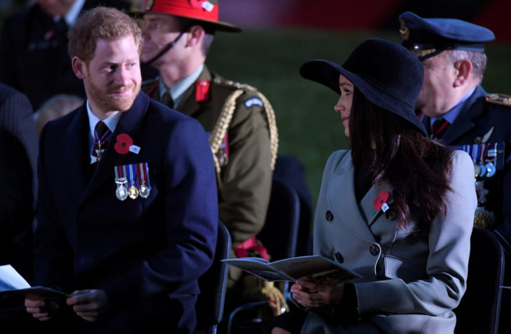 Britain's Prince Harry and his fiancee Meghan Markle attend the Dawn Service at Wellington Arch to commemorate Anzac Day in London, Britain