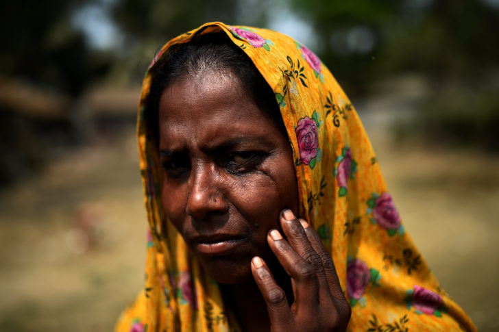 The Wider Image: Rohingya refugees fish in troubled waters