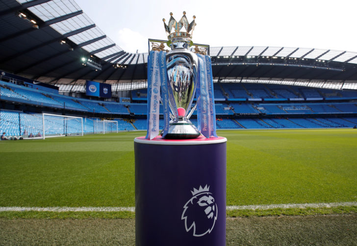 FILE PHOTO: The Premier League trophy is displayed before Manchester City's match against Huddersfield Town at the Etihad Stadium, Manchester