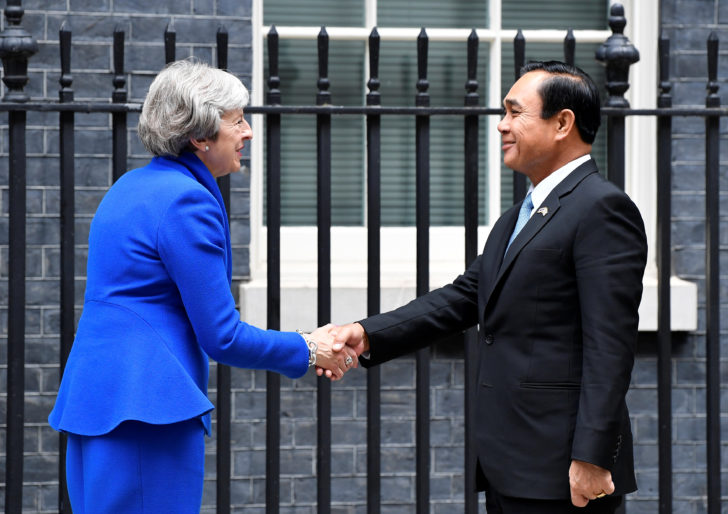 Britain's Prime Minister Theresa May greets Thailand's Prime Minister Prayut Chan-o-cha in Downing Street in London