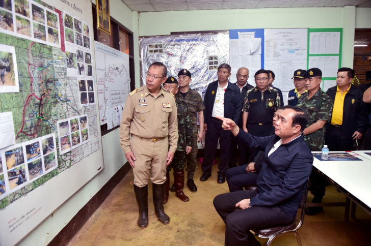 Thailand's PM Prayuth Chan-ocha gestures with acting Chiang Rai province governor Narongsak Osatanakorn in Chiang Rai