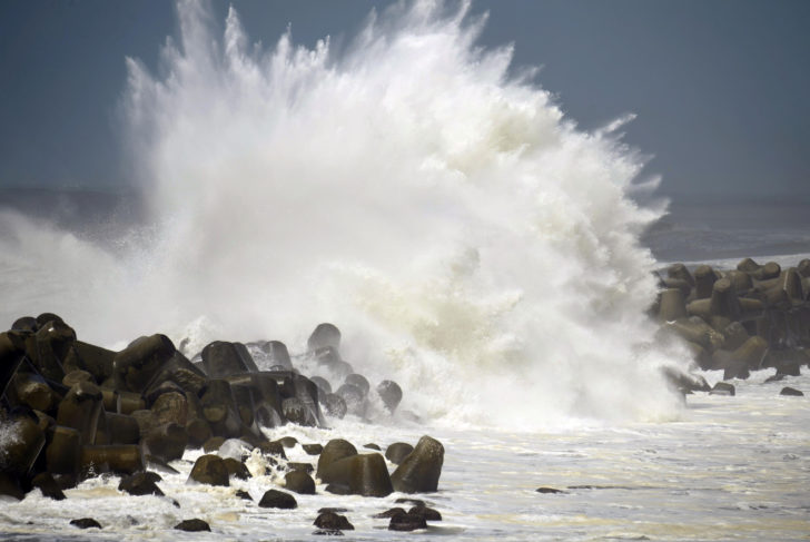 High waves triggered by Typhoon Cimaron crash against the coast of Aki