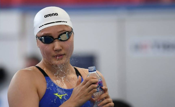 the-chinese-swimmer-who-was-not-named-kicked-south-korea-s-kim-hye-jin-pictured-and-the-pair-had-to-be-separated-by-athletes-and-coaches-the-report-said-1535029248778-4