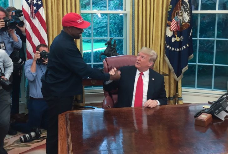 Trump hosts lunch for the rapper Kanye West, with the pair due to discuss issues including gun violence and prison reform