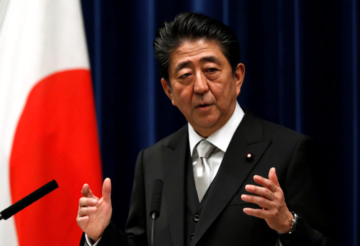 Japan's Prime Minister Shinzo Abe attends a news conference after reshuffling his cabinet, at his official residence in Tokyo