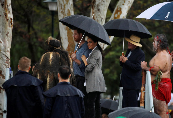 Britain's Prince Harry and his wife Meghan, Duchess of Sussex attend a community picnic at Victoria Park in Dubbo