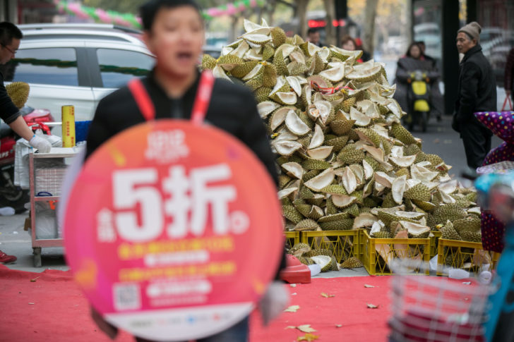 Durian husks are seen outside a fruit store during a Double 12 shopping festival sale, in Hangzhou
