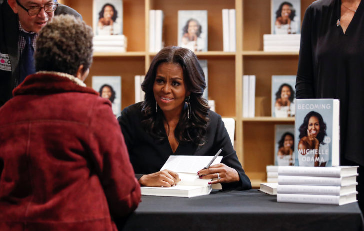 Former first lady Michelle Obama signs copies of her memoir