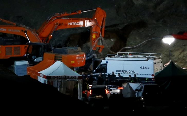 Spanish rescuers are seen after finding the dead body of Julen, a Spanish two-year-old boy who had fallen into a deep narrow well in Totalan, southern Spain