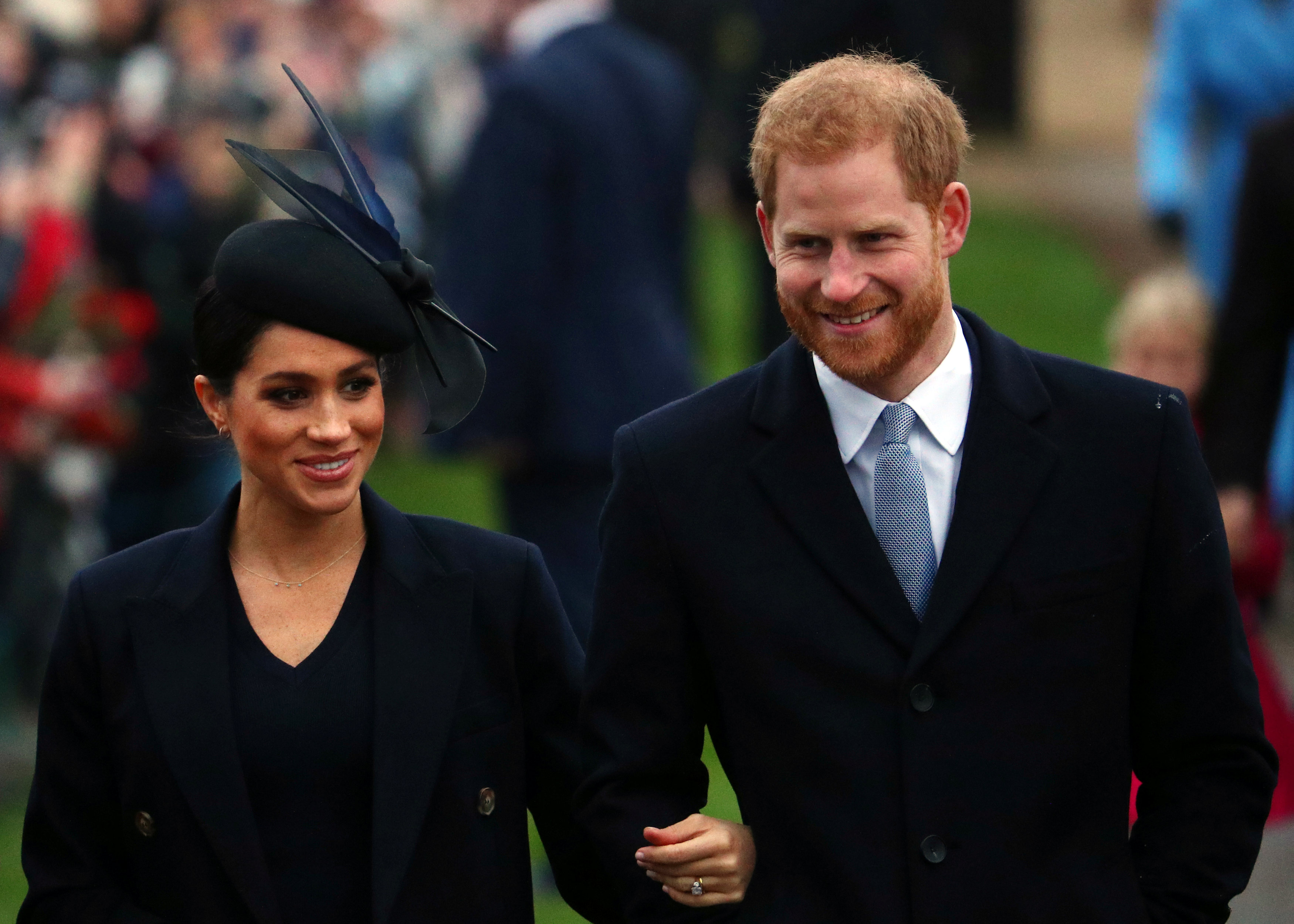 Britain's Prince Harry, Duke of Sussex and Meghan, Duchess of Sussex arrive at St Mary Magdalene's church for the Royal Family's Christmas Day service on the Sandringham estate in eastern England