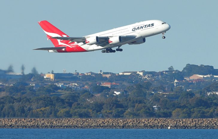 FILE PHOTO - Qantas flight QF1, an Airbus A380 aircraft, takes off from Sydney International Airport en route to Dubai, above Botany Bay