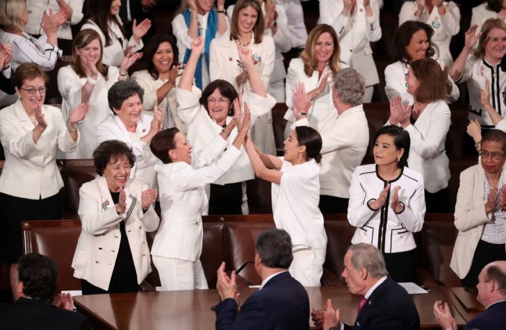 Democratic female members of Congress cheer during U.S. President Trump's second State of the Union address to a joint session of the U.S. Congress in Washington