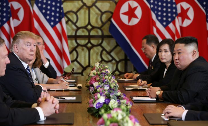 North Korea's leader Kim Jong Un and U.S. President Donald Trump look on during the extended bilateral meeting in the Metropole hotel during the second North Korea-U.S. summit in Hanoi