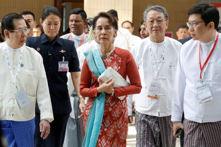 FILE PHOTO: Myanmar's State Counsellor Aung San Suu Kyi attends Invest Myanmar in Naypidaw