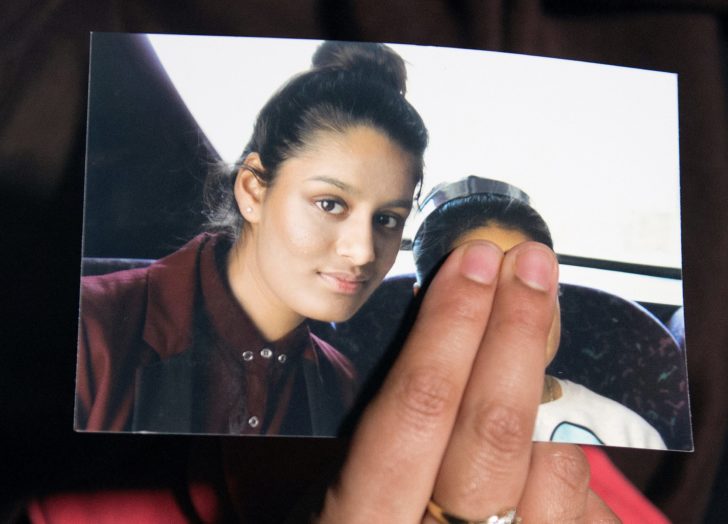 FILE PHOTO: Renu Begum, sister of teenage British girl Shamima Begum, holds a photo of her sister as she makes an appeal for her to return home at Scotland Yard, in London