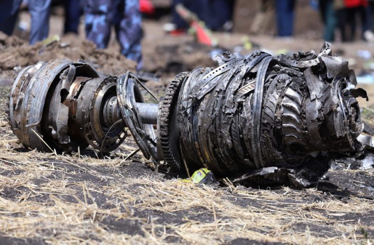 Airplane engine parts are seen at the scene of the Ethiopian Airlines Flight ET 302 plane crash, near the town of Bishoftu