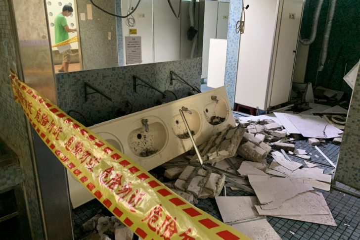 A damaged washroom is seen in a university after an earthquake in Taipei