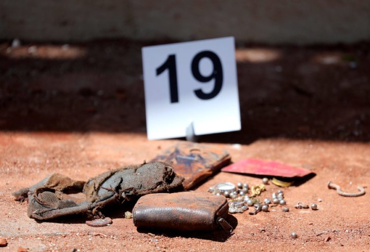 An investigation marker is seen near belongings at St. Sebastian Catholic Church in Negombo