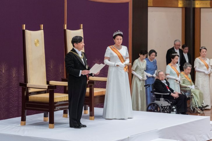 Japan's Emperor Naruhito, flanked by Empress Masako, delivers a speech during a ceremony called Sokui-go-Choken-no-gi, his first audience after the accession to the throne, at the Imperial Palace in Tokyo