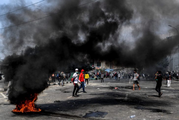 People protest in the streets of Tanah Abang area in Jakarta