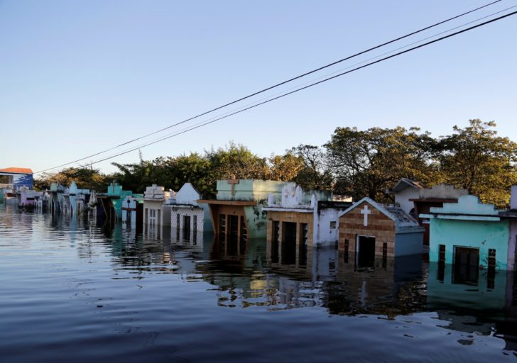 A view of a flooded cemetery after heavy rains caused Paraguay River to overflow, in a neighbourhood on the outskirts of Asuncion