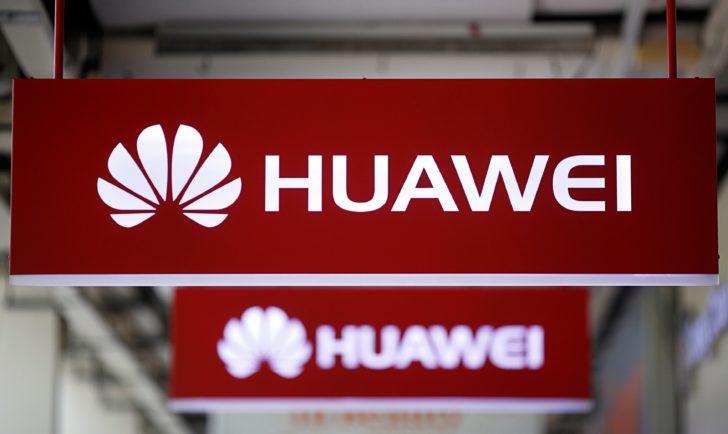 Huawei signage are pictured at a mobile phone shop in Singapore
