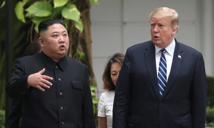 FILE PHOTO: North Korea's leader Kim Jong Un and U.S. President Donald Trump talk in the garden of the Metropole hotel during the second North Korea-U.S. summit in Hanoi