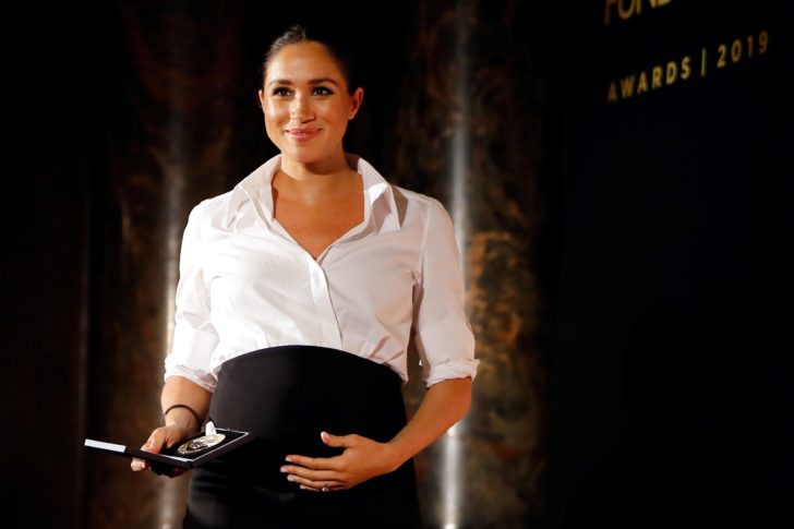 FILE PHOTO: Britain's Prince Harry and Meghan, Duchess of Sussex, attend the Endeavour Fund Awards in the Drapers' Hall in London