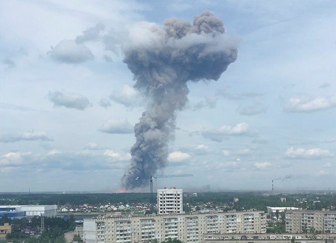A still image, taken from a video footage, shows smoke rising from the site of blasts at an explosives plant in the town of Dzerzhinsk