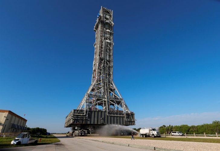 NASA's Space Launch System mobile launcher rolls on a crawler-transporter to Launch Pad 39B at the Kennedy Space Center in Cape Canaveral