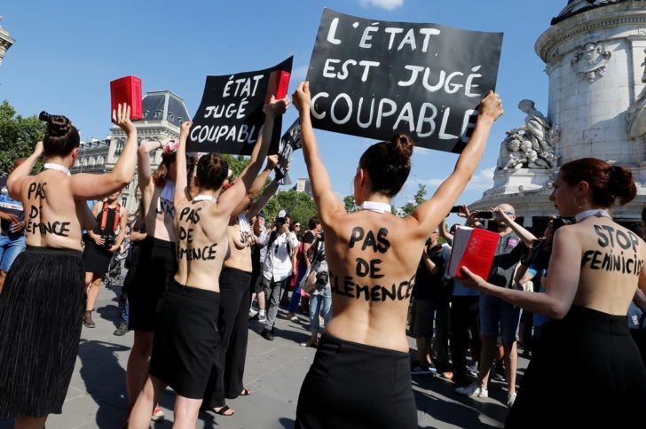 Families of victims and activists attend a rally against