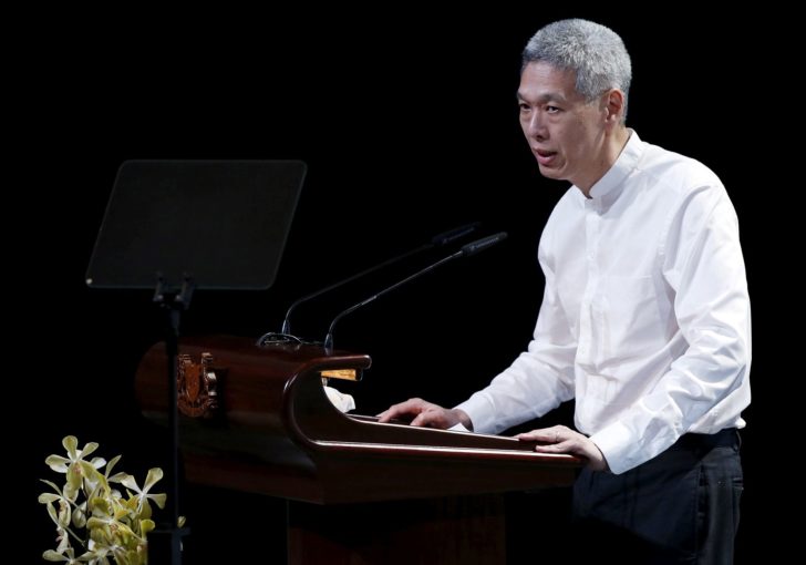 FILE PHOTO: Lee Hsien Yang, son of former leader Lee Kuan Yew, delivers his eulogy during the funeral service at the University Cultural Centre at the National University of Singapore
