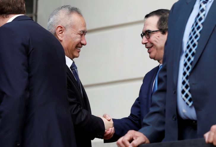 U.S. Treasury Secretary Steve Mnuchin greets China's Vice Premier Liu He prior to trade talks in Washington