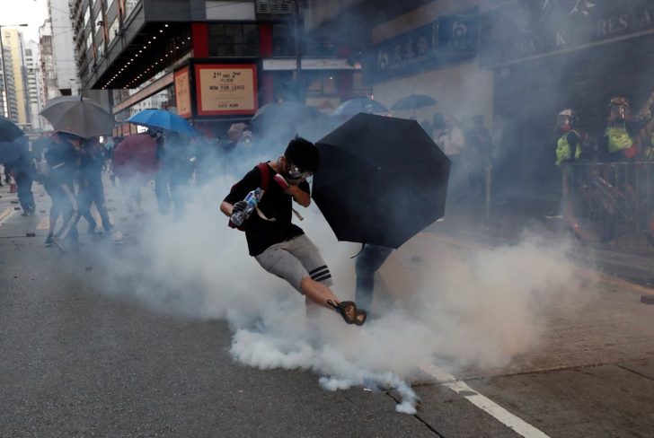 Hong Kong police fire tear gas in feverish start to 22nd weekend of protests in Hong Kong