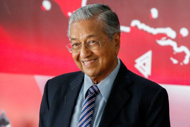 Malaysian Prime Minister Mahathir Mohamad reacts after attending the inauguration of Indonesia's President Joko Widodo for the second term, at the House of Representatives building in Jakarta