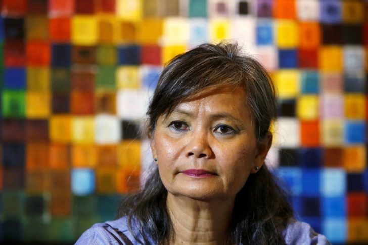 FILE PHOTO: Mu Sochua, Deputy President of the Cambodia National Rescue Party (CNRP), listens during an interview with Reuters in Phnom Penh