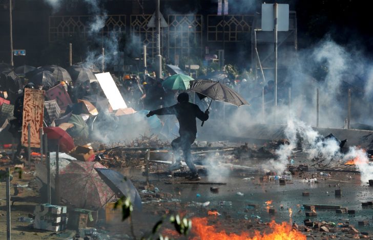 Protesters clash with police outside Hong Kong Polytechnic University (PolyU) in Hong Kong