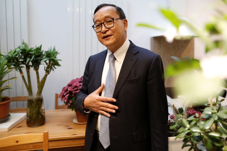 Self-exiled Cambodian opposition party founder Sam Rainsy attends an interview with Reuters in Paris