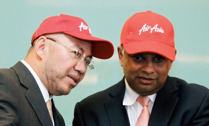 FILE PHOTO: AirAsia's Tony Fernandes and Kamarudin Meranun during news conference in Kuala Lumpur