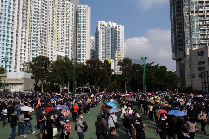 Customers queue up to buy masks amid an outbreak of a new coronavirus, in Hong Kong