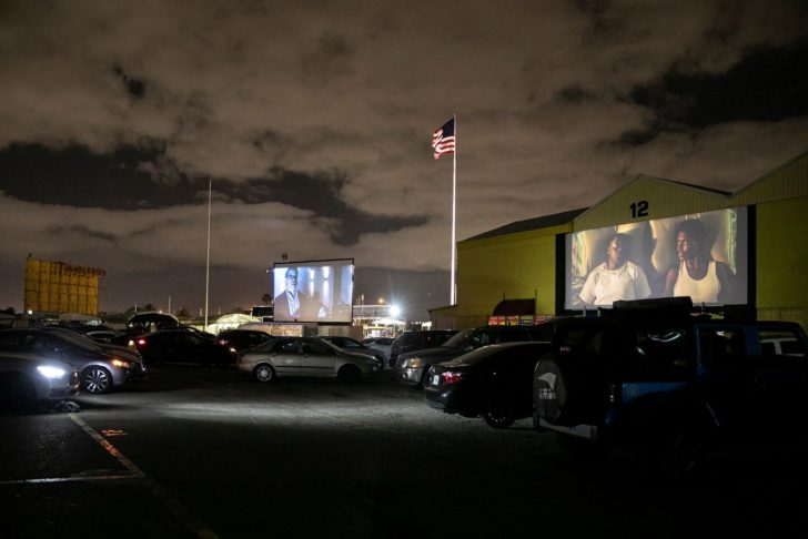People enjoy movies at a drive-in theatre while keeping social distancing following the outbreak of the coronavirus disease in Fort Lauderdale