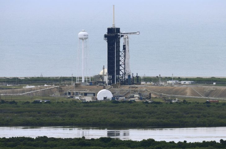 A SpaceX Falcon 9 rocket and Crew Dragon spacecraft carrying NASA astronauts Douglas Hurley and Robert Behnken is seen before scheduled launch from NASA's Kennedy Space Center in Cape Canaveral