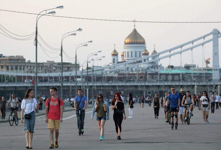 People walk at the Gorky Central Park of Culture and Leisure in Moscow