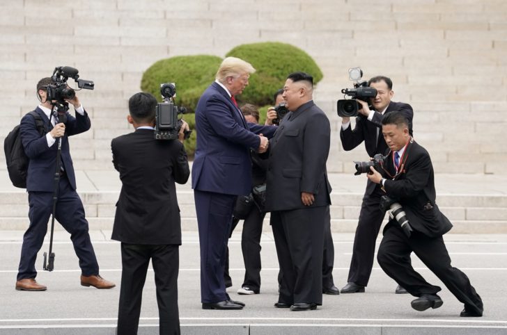 FILE PHOTO: File picture of U.S. President Donald Trump meeting North Korean leader Kim Jong Un