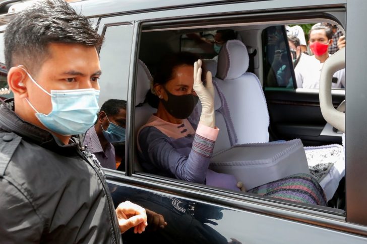 Myanmar leader Aung San Suu Kyi arrives to the electoral commision to formalize her re-election bid as a parliament member in Yangon