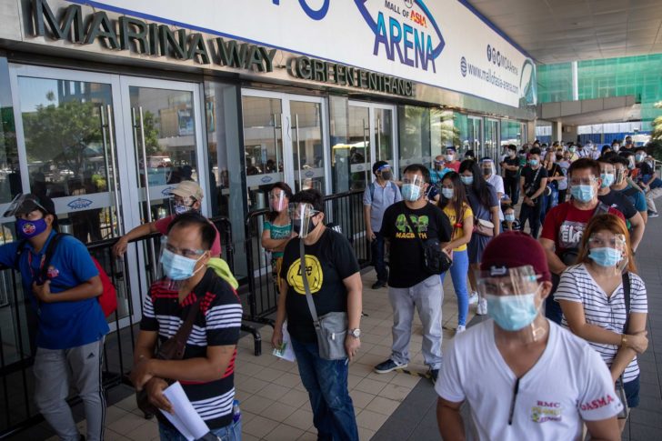 Long lines for free COVID-19 testing in Manila